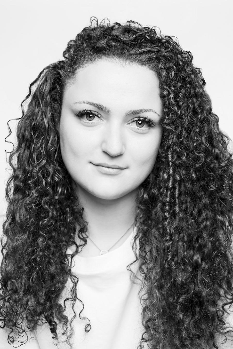 Black and white studio portrait of Natalie Kalnicky